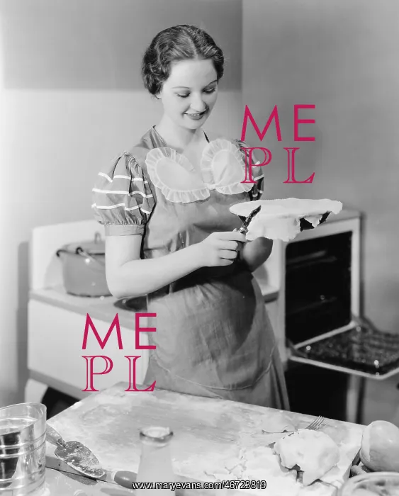 : Woman preparing a pie in the kitchen : Woman preparing a pie in the kitchen