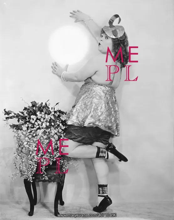 : Woman pretending to hold the moon against the wall : Woman pretending to hold the moon against the wall