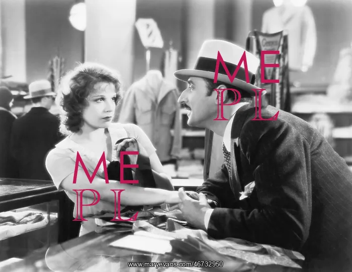 : Woman pulling away from a man in a store : Woman pulling away from a man in a store