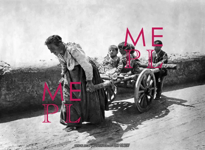 : Woman pulling her children in a cart, 1925 : Woman pulling her children in a cart, 1925