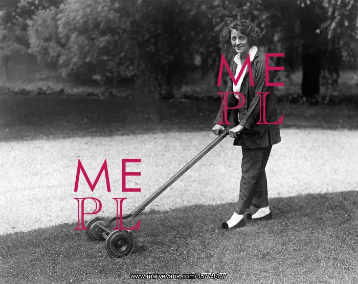 : Woman with push mower : Woman with push mower
