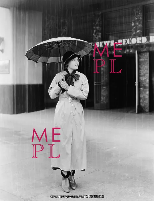 : Woman in a raincoat and umbrella : Woman in a raincoat and umbrella