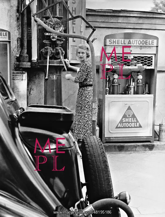 : A woman refueling, 1938 : A woman refueling, 1938