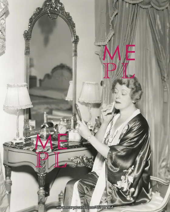  : Woman removing her makeup