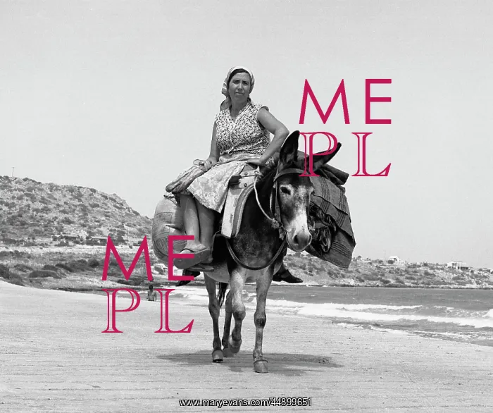 : Woman riding a donkey along a beach : Woman riding a donkey along a beach
