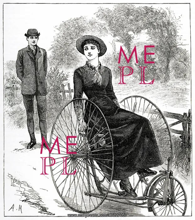  : Woman riding a Tricycle