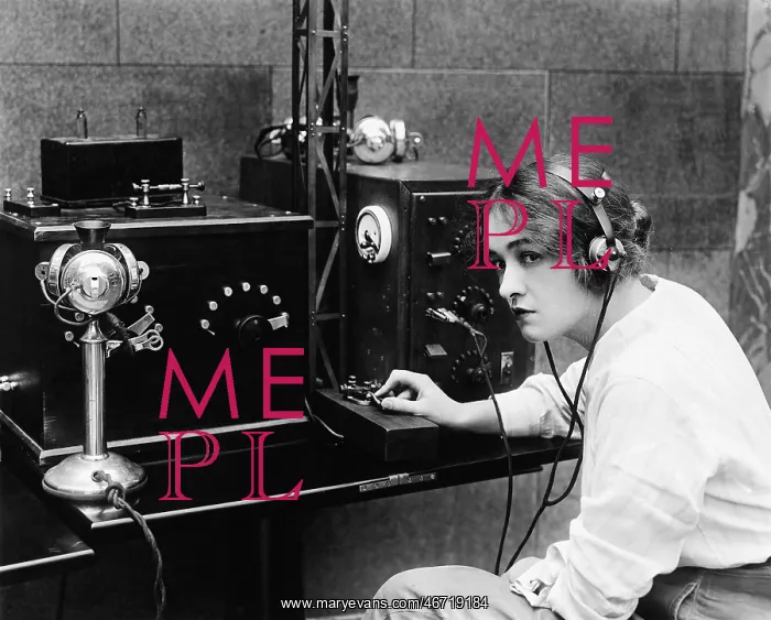 : Woman sending Morse code using telegraph : Woman sending Morse code using telegraph