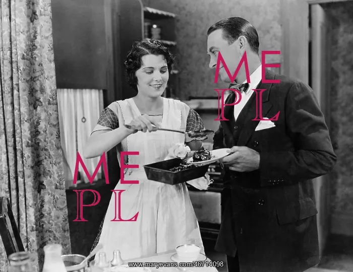 : Woman serving food to man : Woman serving food to man