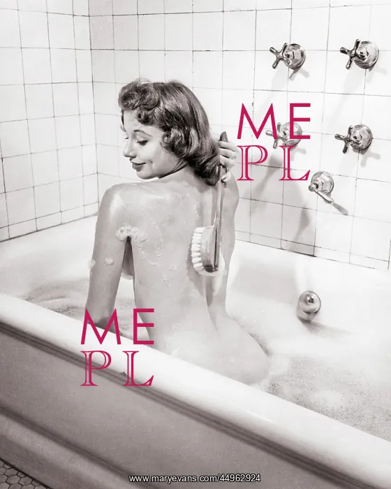 : Woman Sitting in Bath Using Back Brush to Clean : Woman Sitting in Bath Using Back Brush to Clean