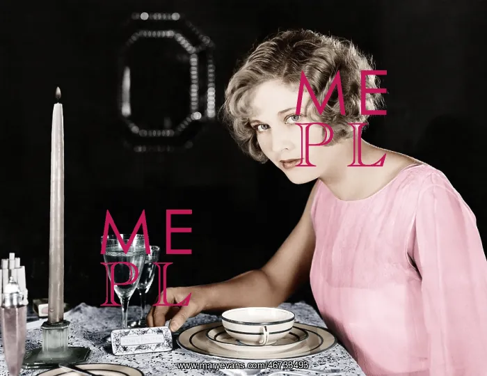 : Woman sitting at the dinner table : Woman sitting at the dinner table