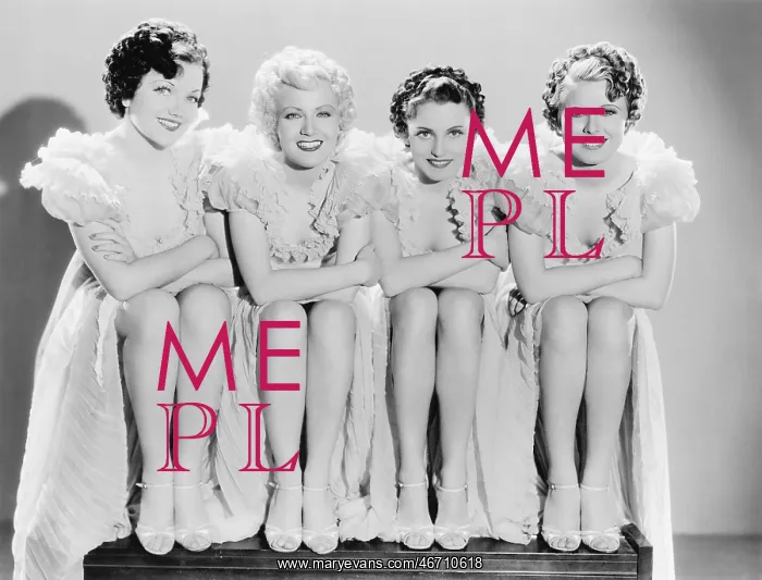 : Four woman sitting together and posing : Four woman sitting together and posing
