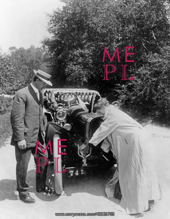 : Woman starting an engine, 1907 : Woman starting an engine, 1907