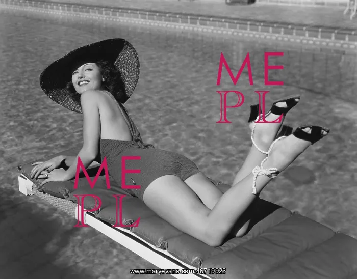 : Woman sunbathing at pool : Woman sunbathing at pool