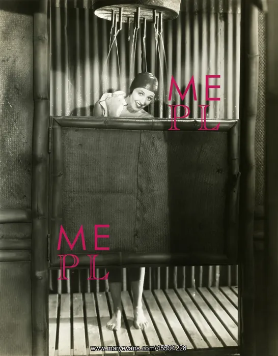 : Woman takes a shower in a bathing cap - : Woman takes a shower in a bathing cap -