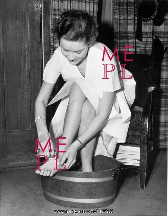 : Woman taking footbath, 1937 : Woman taking footbath, 1937