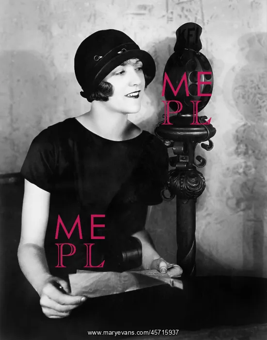 : Woman talking into a microphone : Woman talking into a microphone