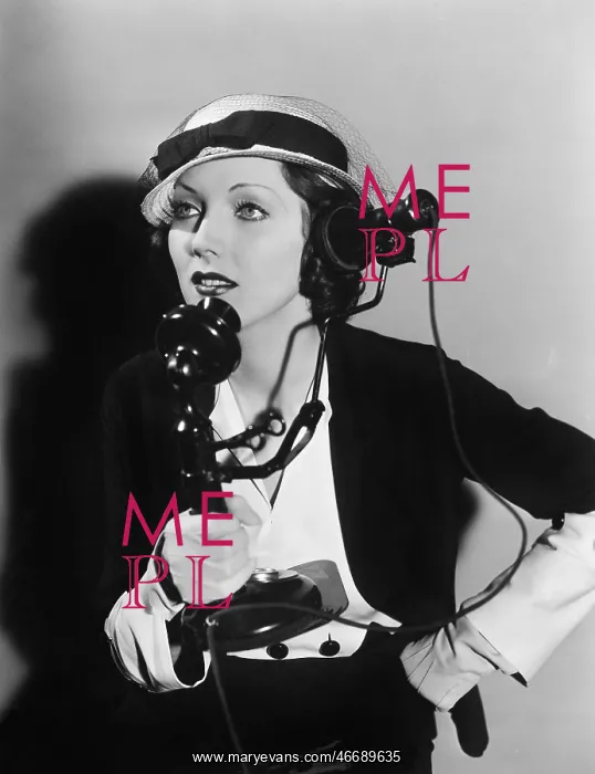 : Woman talking on the telephone : Woman talking on the telephone
