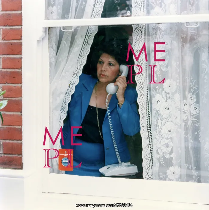 : Woman on telephone reporting something suspicious : Woman on telephone reporting something suspicious