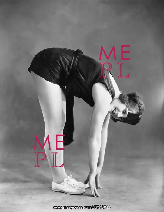 : Woman touching toes : Woman touching toes