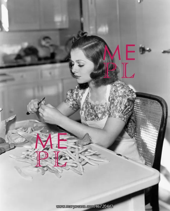 : Woman trimming beans : Woman trimming beans