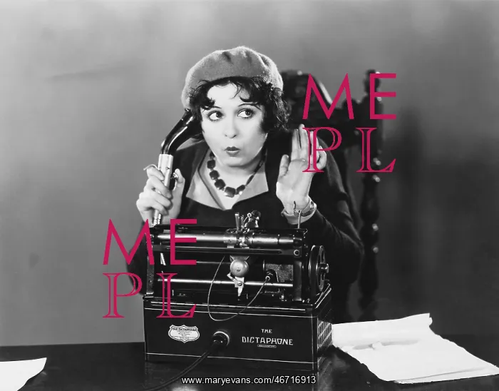 : Woman using Dictaphone : Woman using Dictaphone