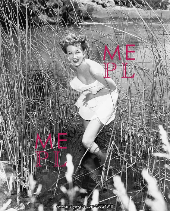  : Woman wading in reeds