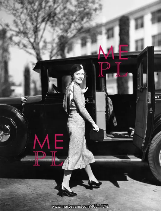  : Woman walking to car