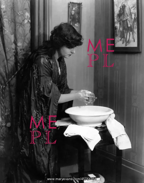  : Woman washing her hands in basin