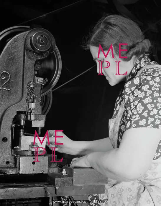 : Woman worker punching holes in electrical : Woman worker punching holes in electrical