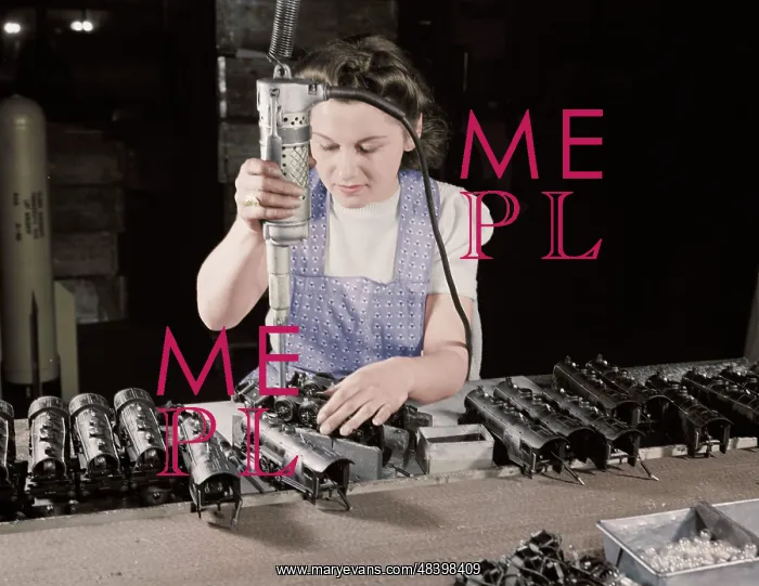  : Woman worker using an electric screwdriver