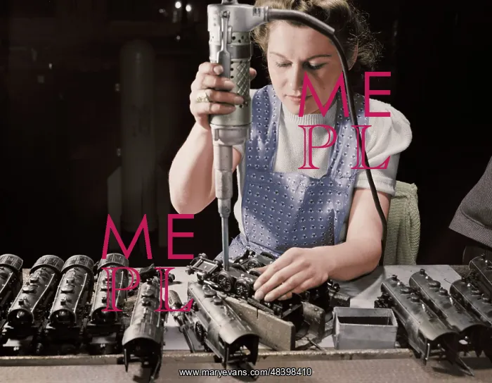 : Woman worker using an electric screwdriver : Woman worker using an electric screwdriver