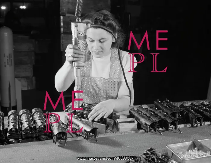 : Woman worker using an electric screwdriver : Woman worker using an electric screwdriver