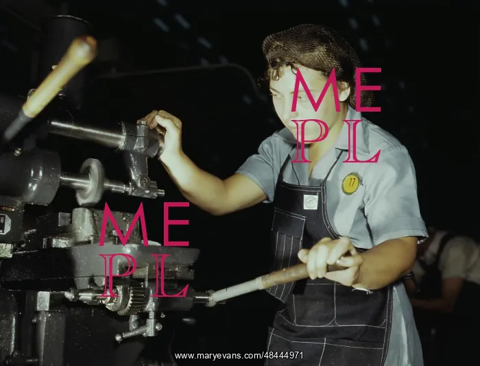 : Woman working a hand mill as she makes parts : Woman working a hand mill as she makes parts