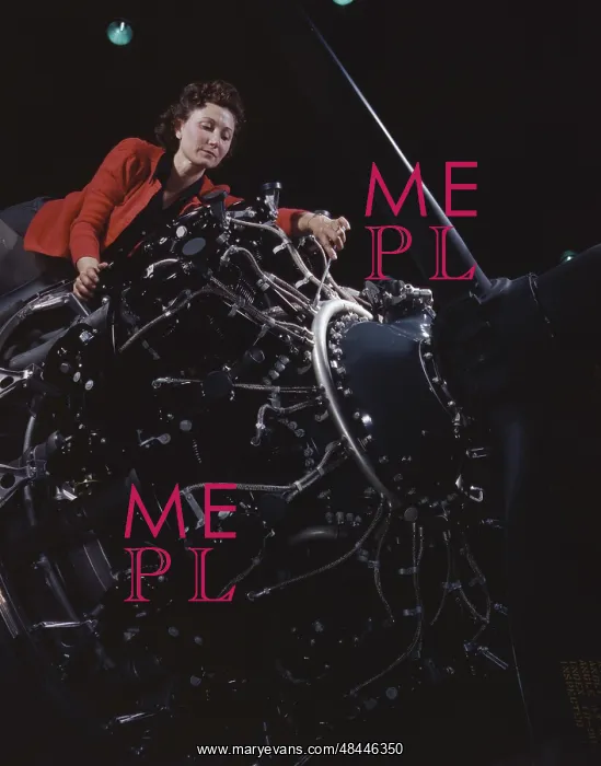 : Woman working on a large motor at the Douglas : Woman working on a large motor at the Douglas
