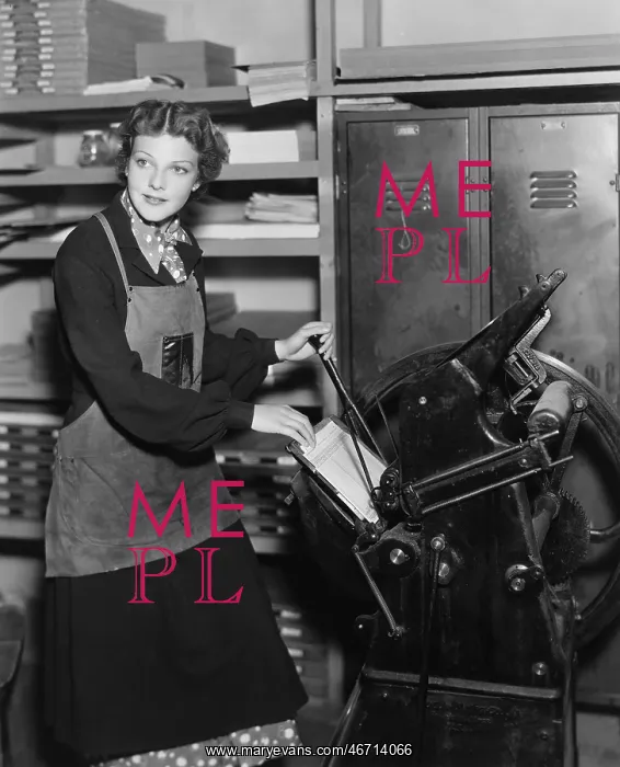 : Woman working in print shop : Woman working in print shop