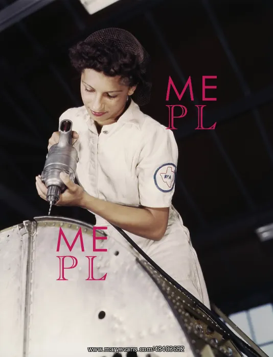 : Woman working with a rivet gun, training to : Woman working with a rivet gun, training to