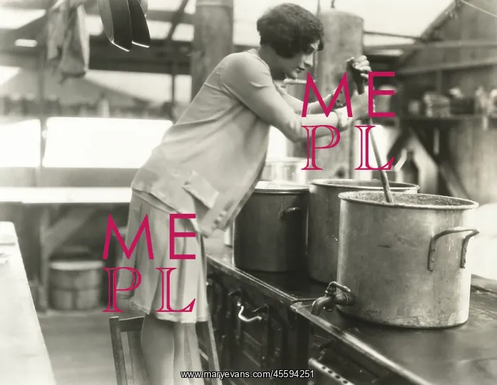  : Woman working in soup kitchen
