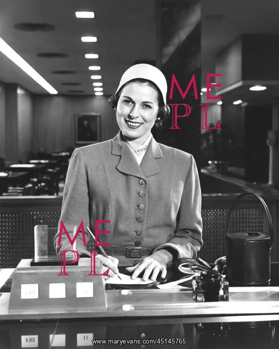 : Woman Writing A Check Smiling : Woman Writing A Check Smiling