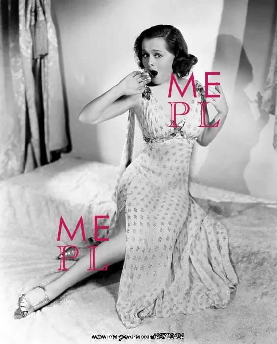 : Woman yawning on bed : Woman yawning on bed
