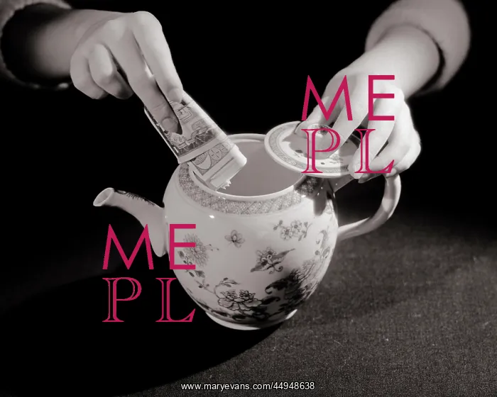 : Woman?s Hands Putting Cash into Teapot Hiding : Woman?s Hands Putting Cash into Teapot Hiding