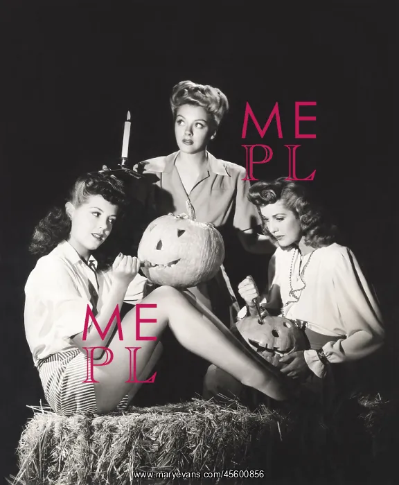: Three women in a barn carving pumpkins at night : Three women in a barn carving pumpkins at night