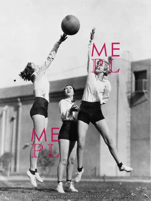 : Three women with basketball in the air : Three women with basketball in the air