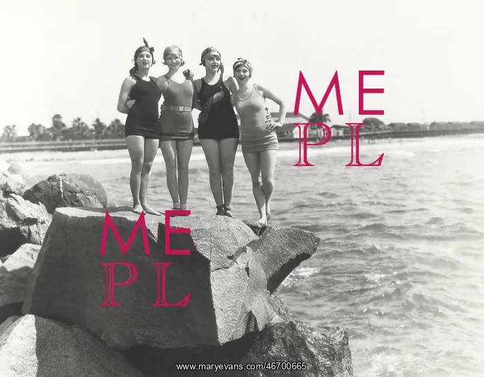  : Women in bathing suits posing on rock