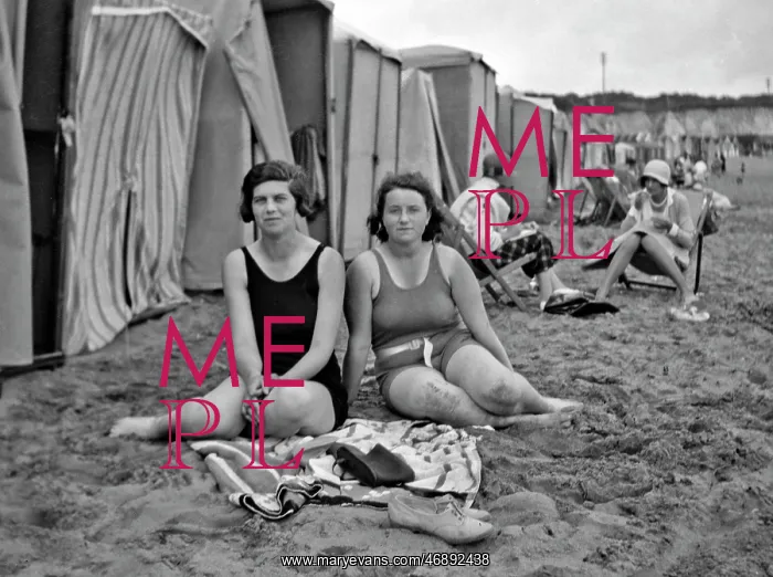 : Women on a beach at a seaside resort : Women on a beach at a seaside resort
