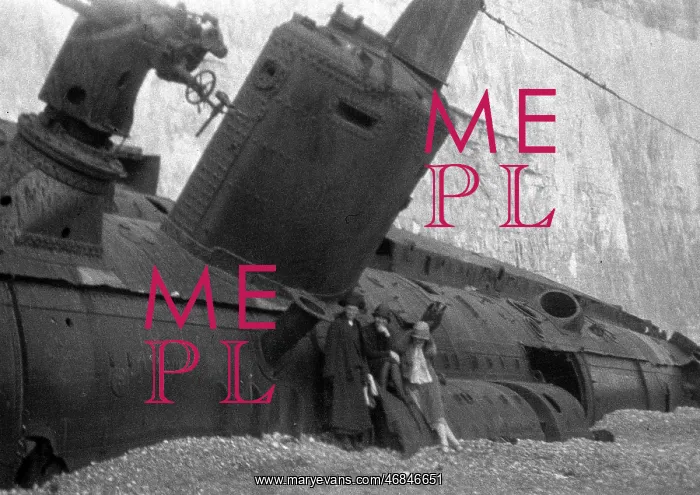 : Three women with beached submarine : Three women with beached submarine