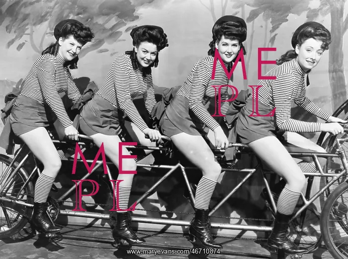 : Four women on a bicycle : Four women on a bicycle