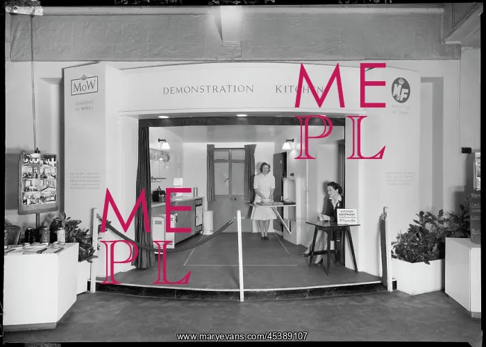 : Two women in a demonstration kitchen : Two women in a demonstration kitchen