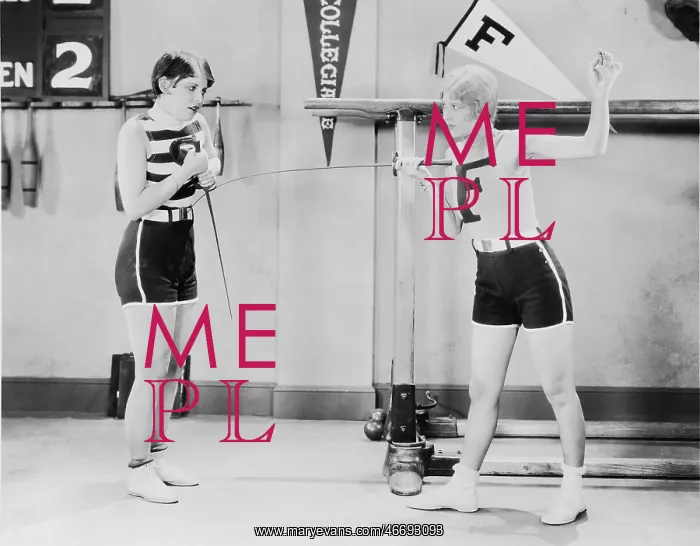 : Two women doing fencing practice : Two women doing fencing practice