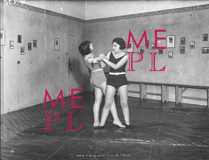 : Women doing judo in a gym : Women doing judo in a gym