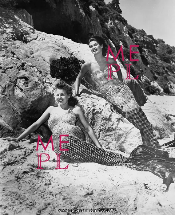 : Women dressed as mermaids on the beach : Women dressed as mermaids on the beach